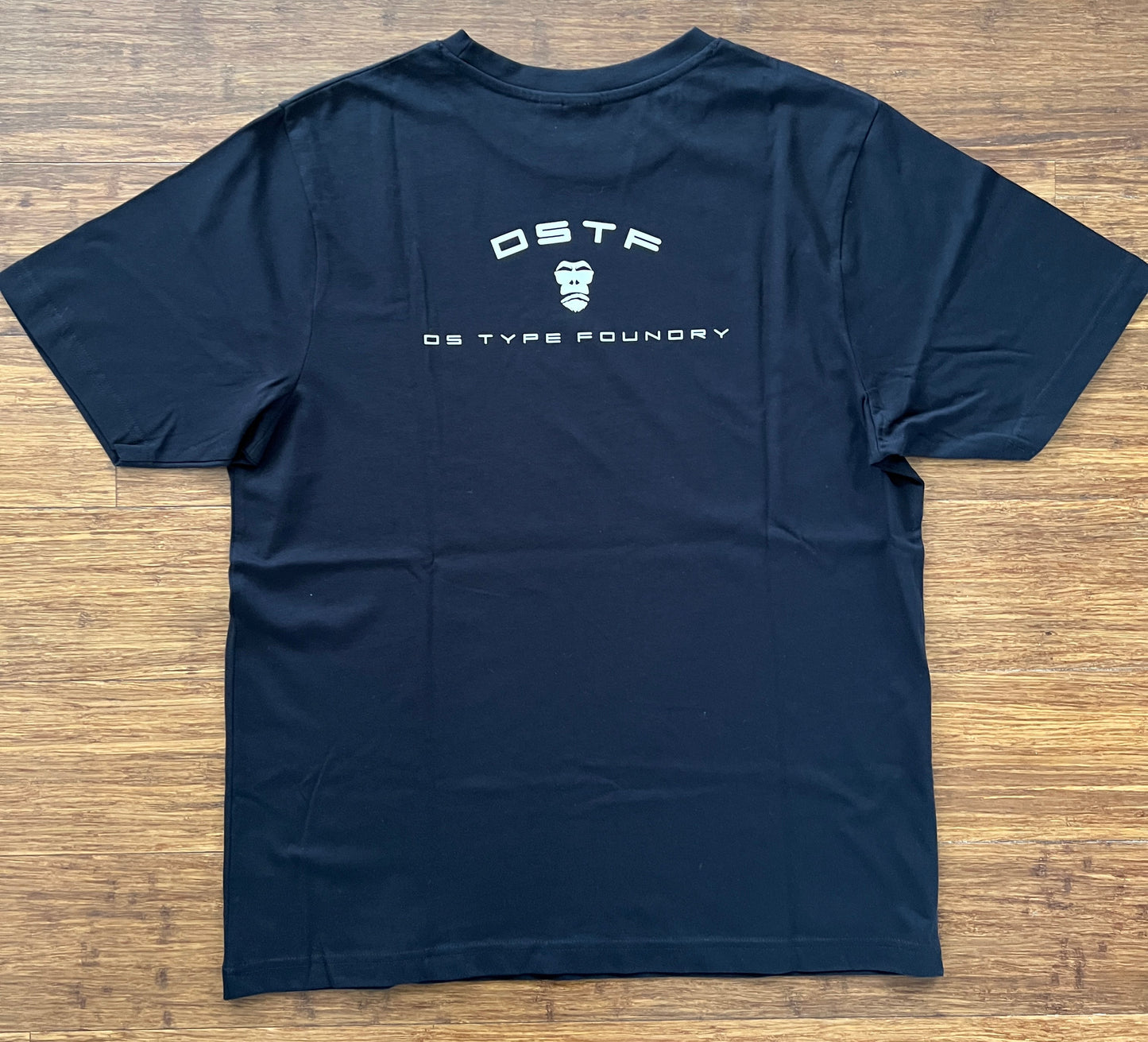 100347 DSTF logo in cream on black cotton tee