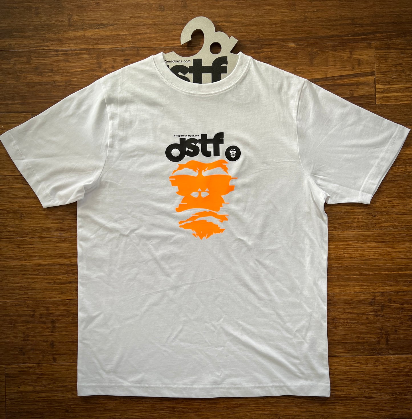 100339 Glitching Gorilla in fluro orange on white t-shirt