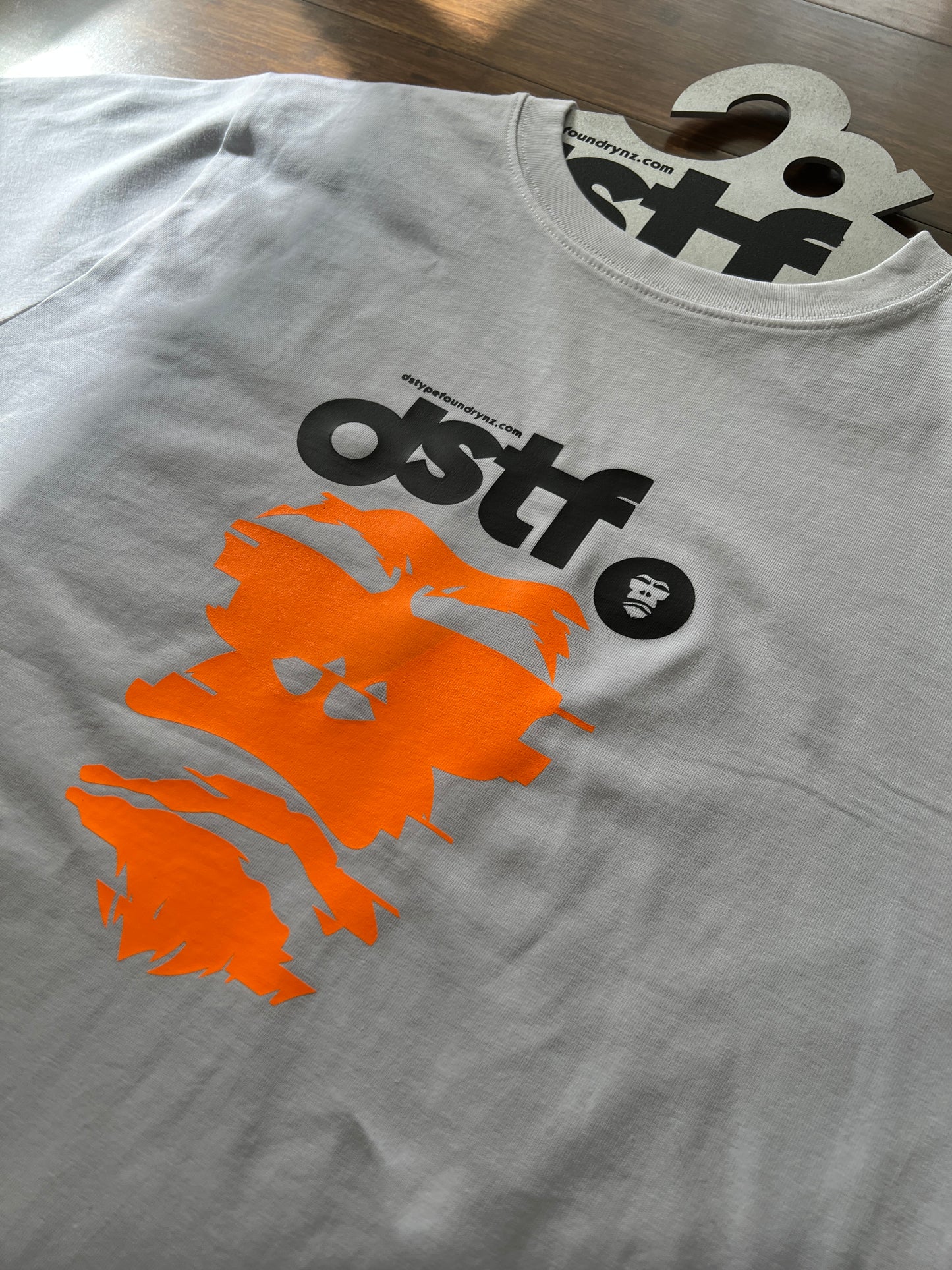 100339 Glitching Gorilla in fluro orange on white t-shirt