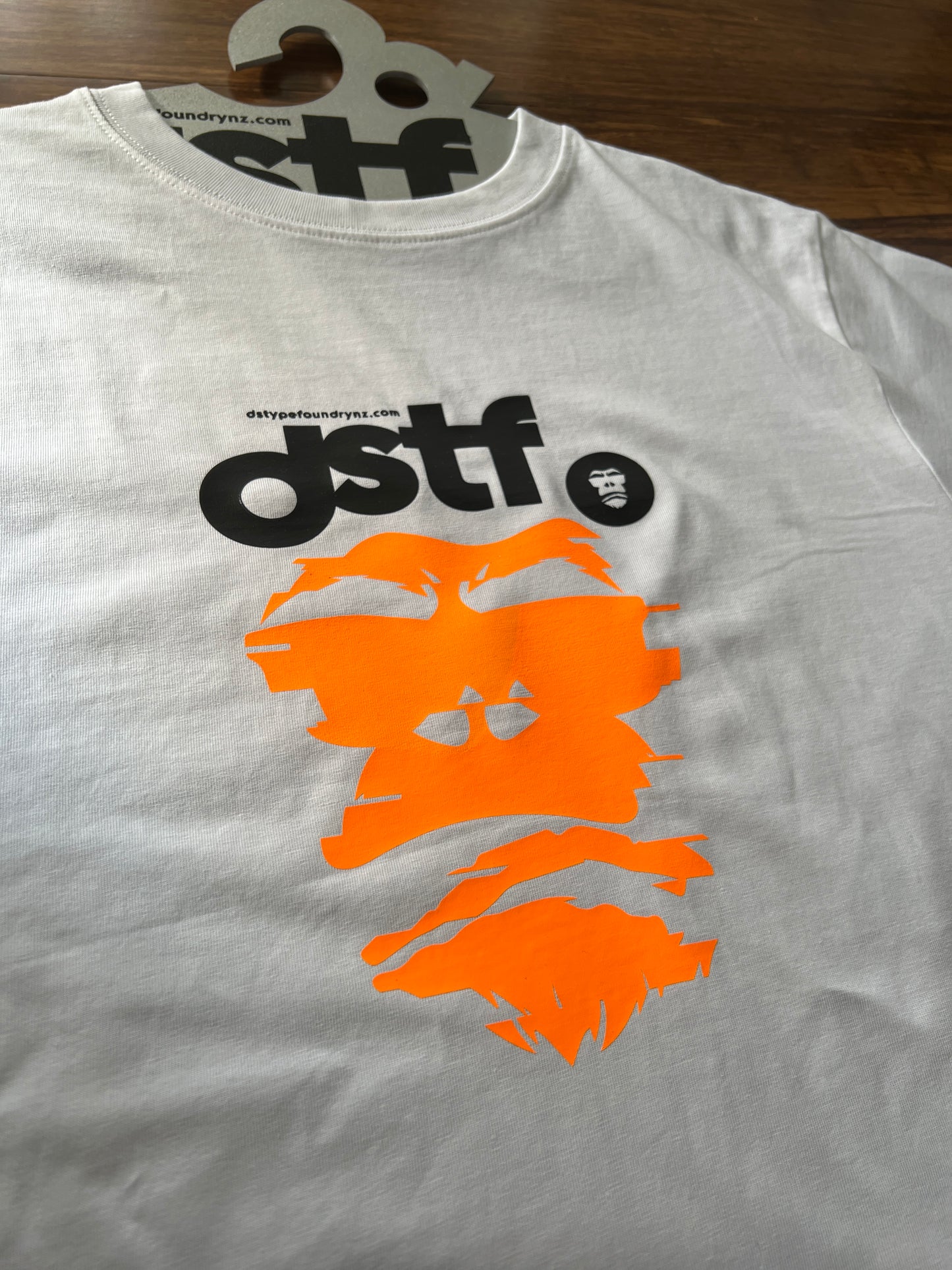 100339 Glitching Gorilla in fluro orange on white t-shirt
