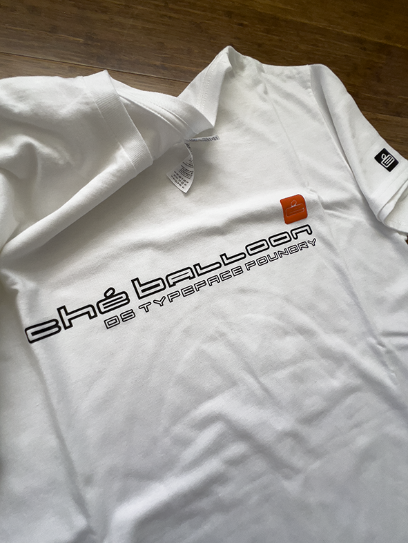Che Balloon in Black on White short sleeve t'shirt. Heavyweight 100% cotton 220gsm. Typeface: Che Balloon