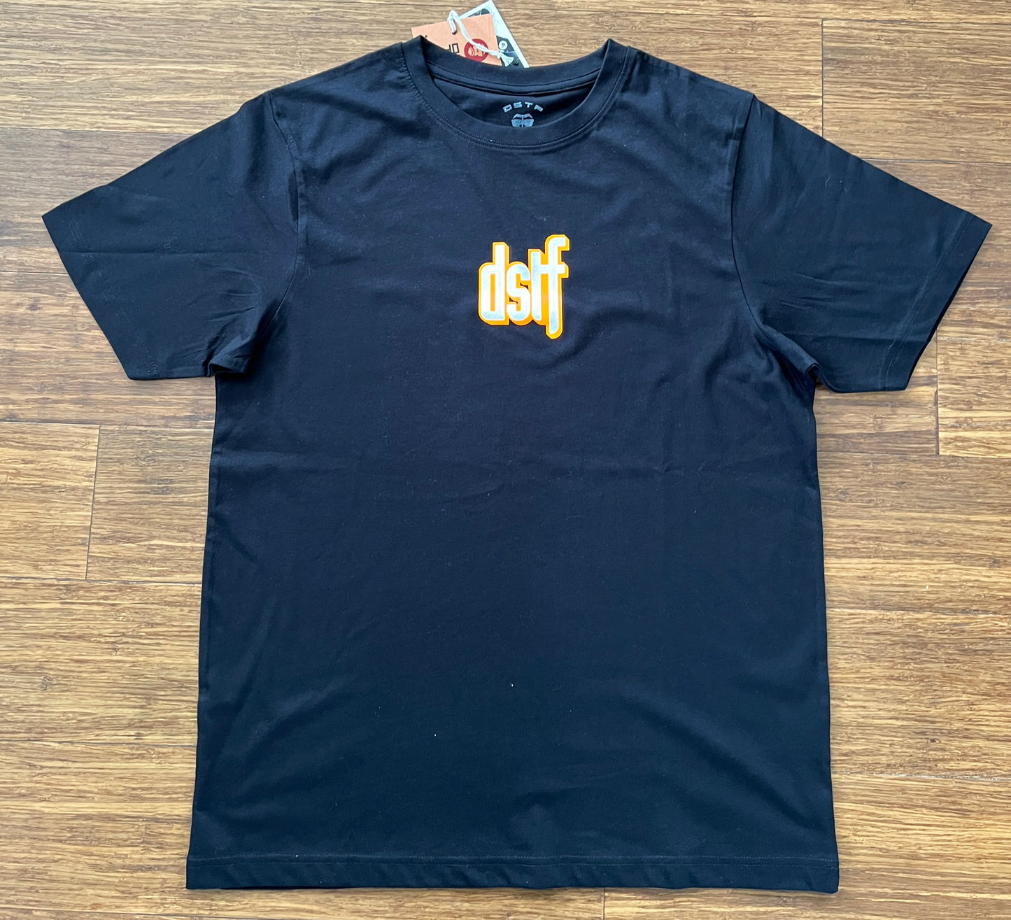 100345 DSTF logo 3D in Fluorescent Orange on black tee