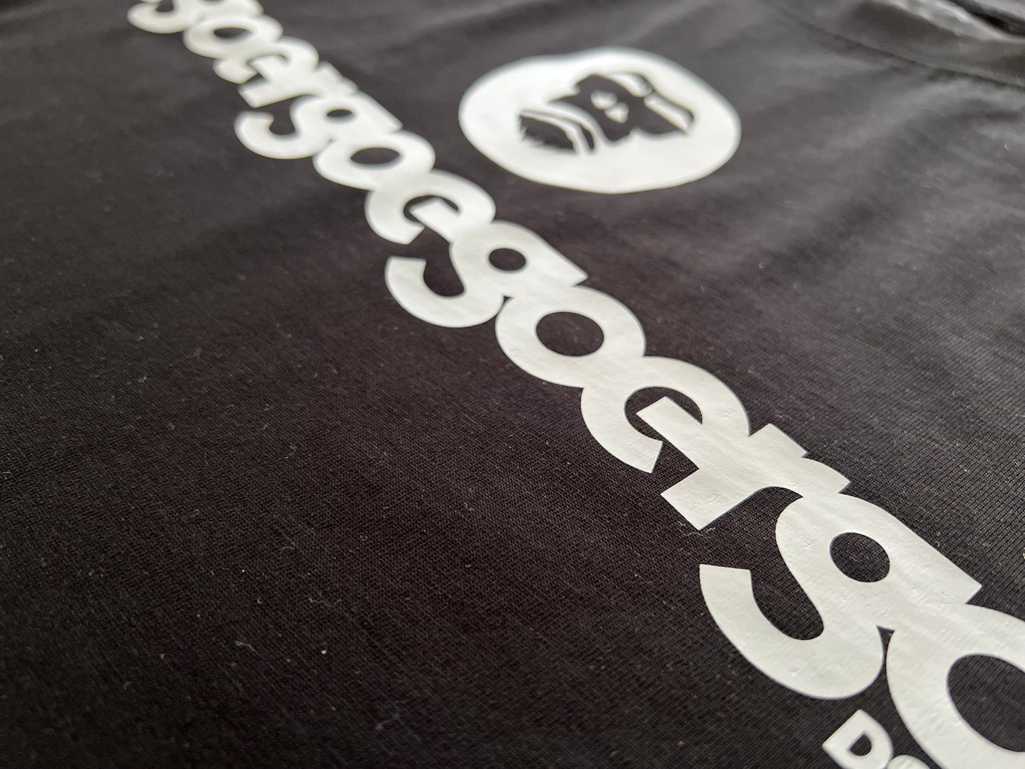 100342 egoergoegoergo in grey on black cotton tee