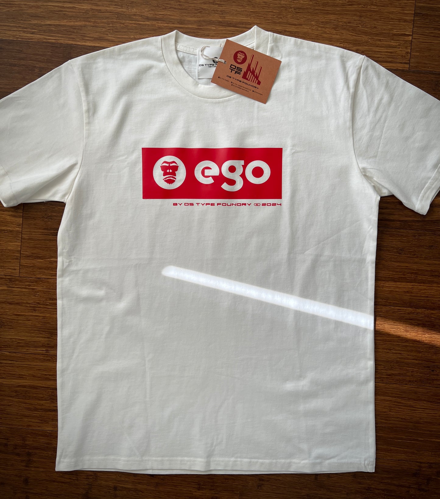 Ego t-shirt in Red on Natural, 100% cotton Tee. Typeface: Ego