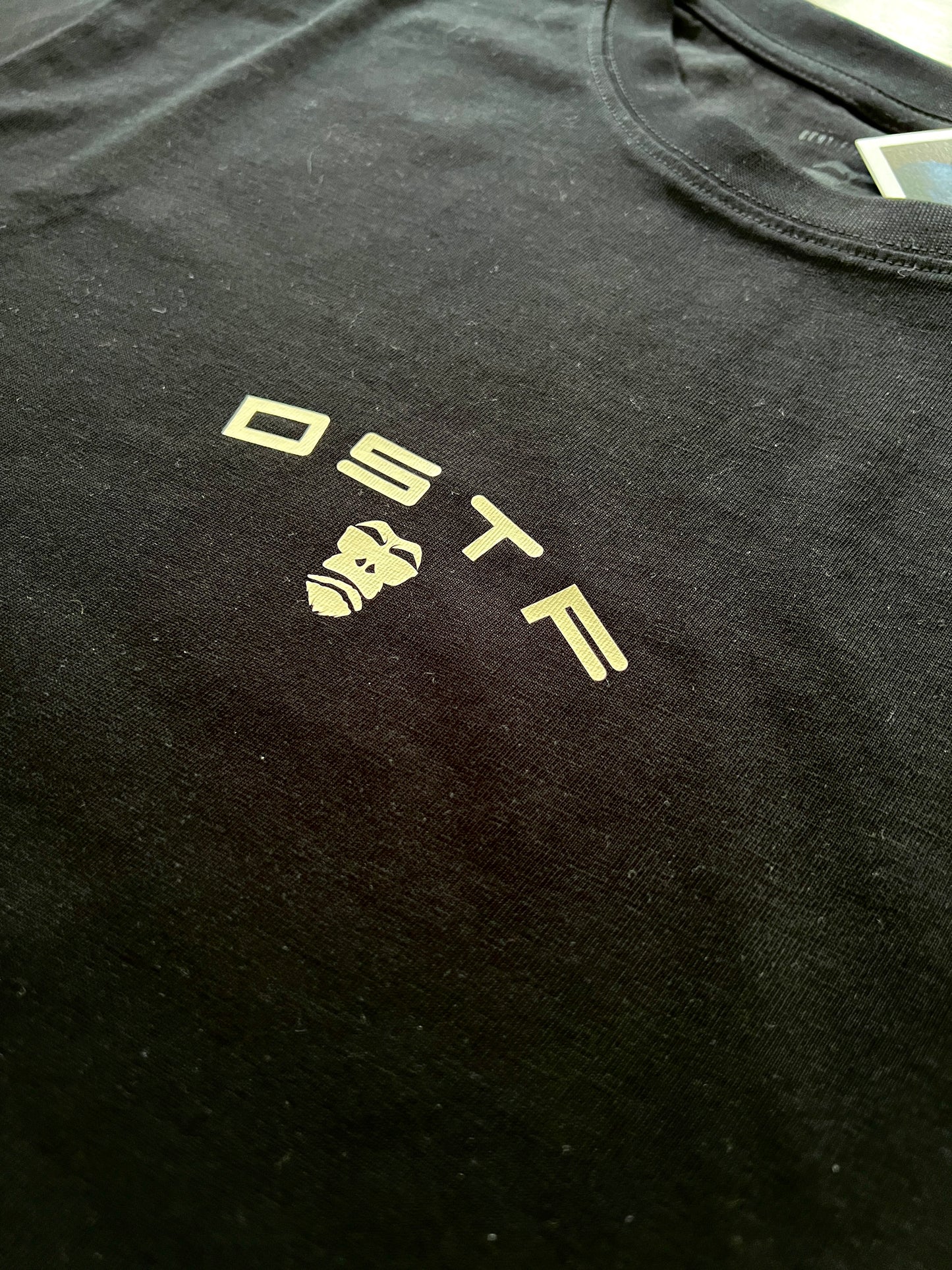 100347 DSTF logo in cream on black cotton tee