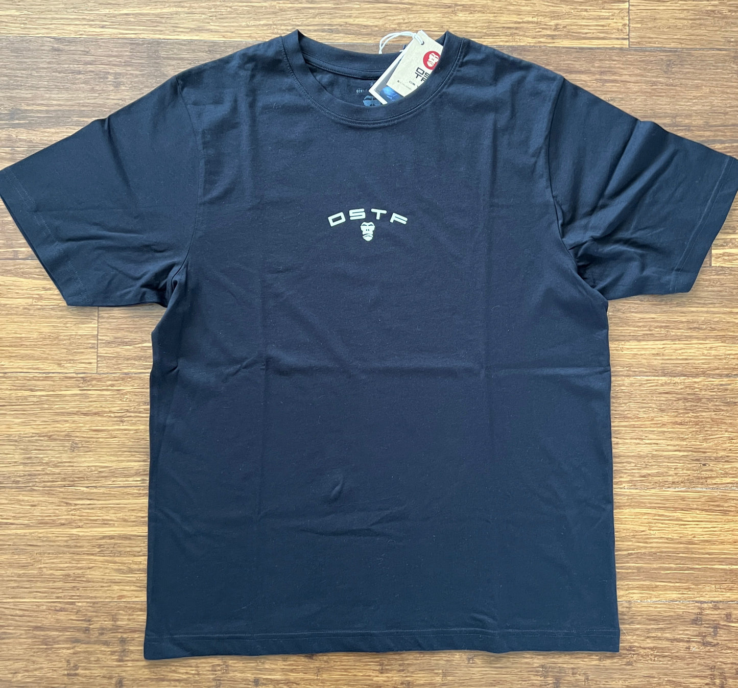 100347 DSTF logo in cream on black cotton tee
