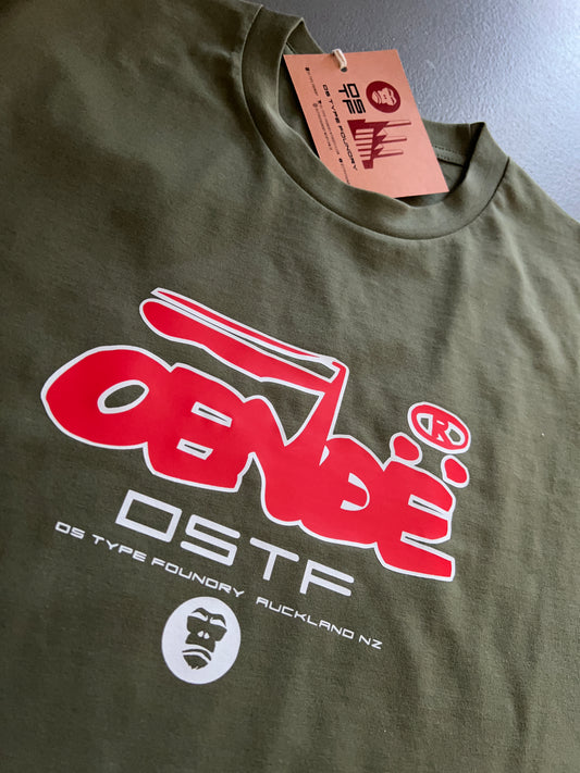 OENDE in red and white on khaki 100% cotton Tee. Can be available in medium weight 185gsm (6.5oz) and heavy weight 220gsm (7.7oz). Typeface: Union