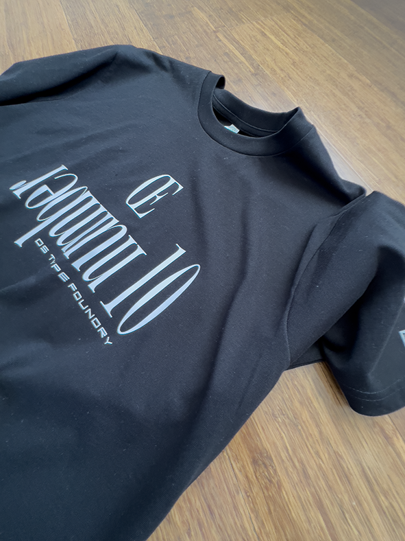 Number 10 (in reverse) in White on Black tee. Heavyweight 100% cotton 220gsm. Typeface: Number 10