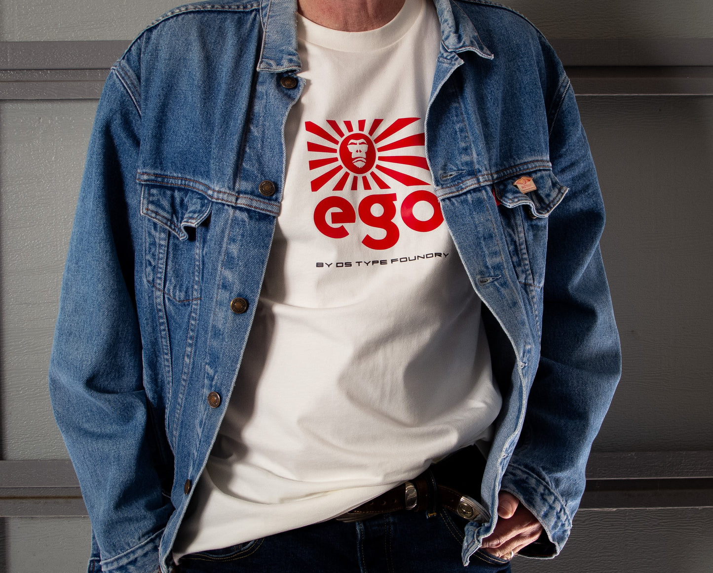 Ego in red on Natural White (cream) tee, 100% cotton. Typeface: Ego