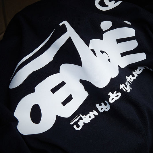 OENDE in White on Navy Blue heavyweight, 100% cotton 220gsm (7.7oz).