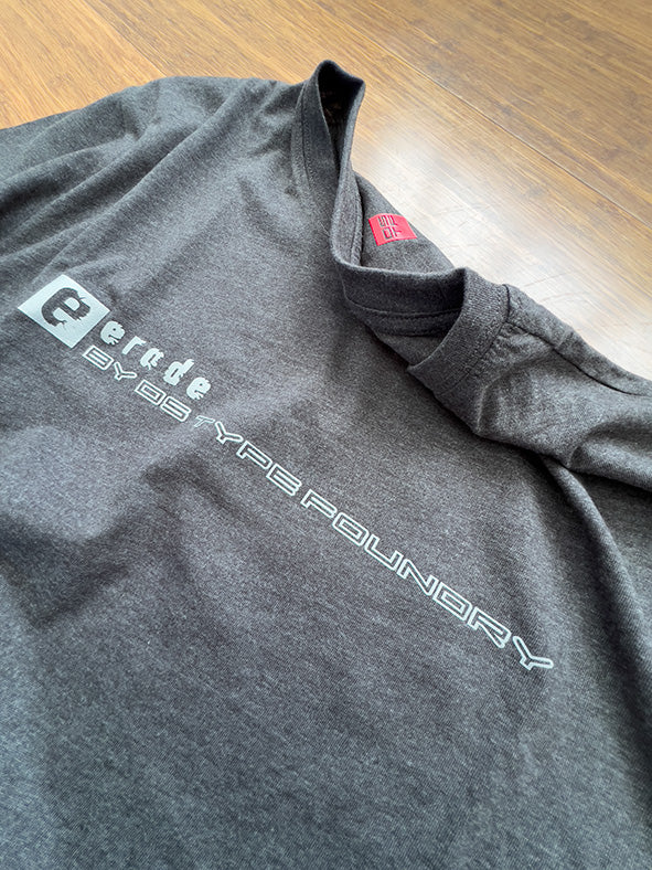 Erode in Reflective Silver tee with red DSTF logo on back. 100% cotton. Typeface: Erode