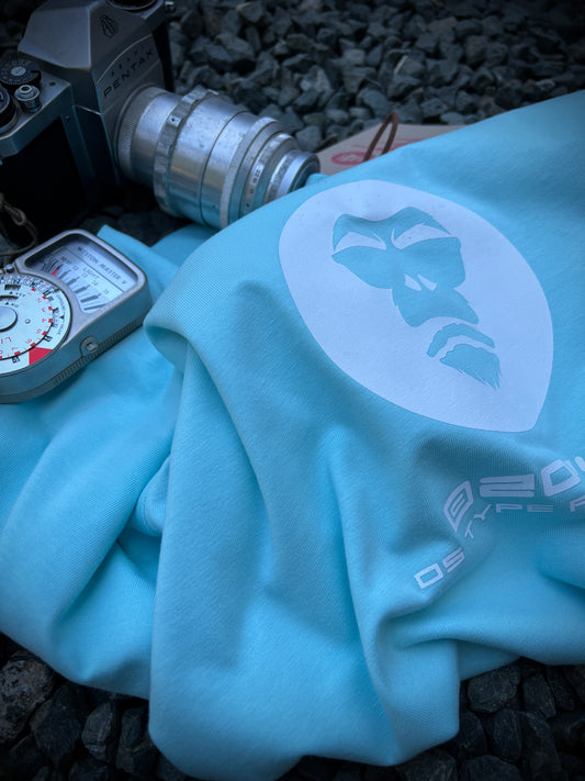 Gorilla 2024 in White on Light Blue heavyweight, 100% cotton 220gsm.